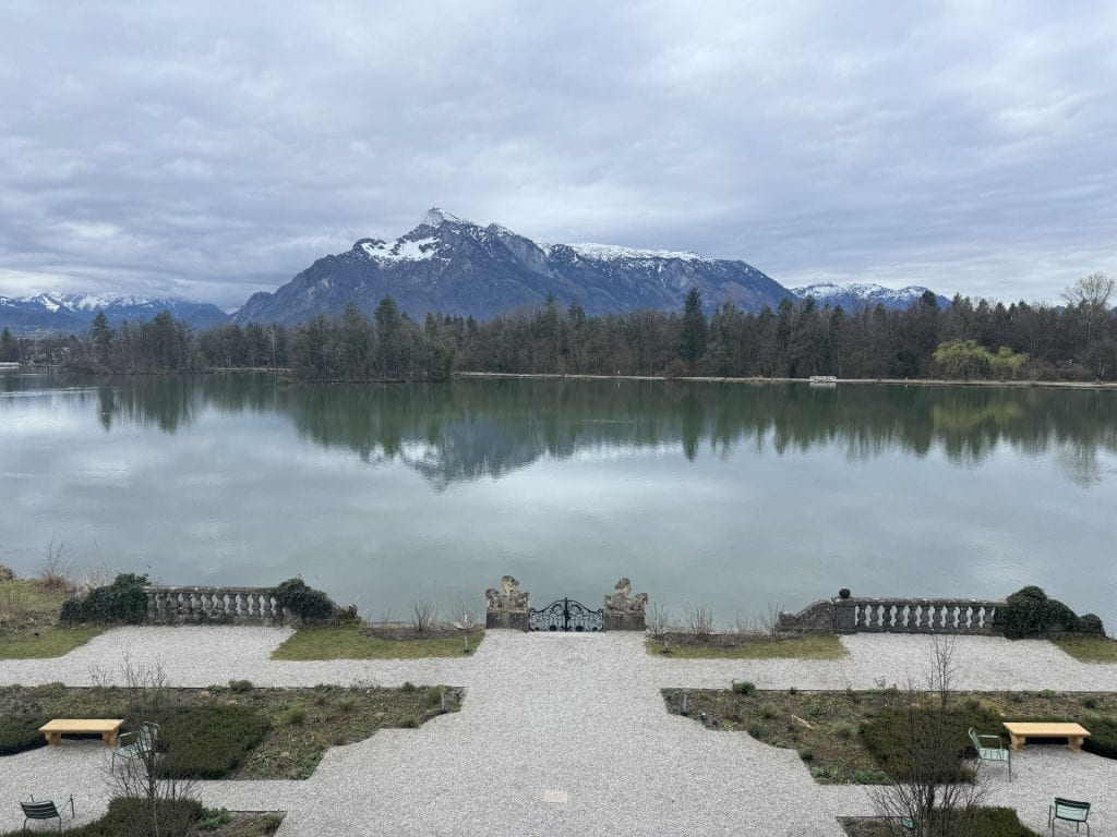 The view from behind the Schloss of the lake and Alps where the Sound of Music was filmed
