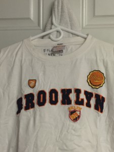 This is a photo of a bequest that one of our sources was kind enough to send our way. The shirt is from a Brooklyn rugby team in New York City. Each item  passed along is meant to be meaningful in one way or another and be representative of both the individual who wears it and the greater house. This item originally belonged to a '13 from New York City who played rugby at Dartmouth who wanted to pass down both of those parts of him through this shirt.  Each member inscribes the name of the next in line, and this item was passed along to another rugby player in the '14 class before making its way to a rugby '16 and now a rugby '17. 