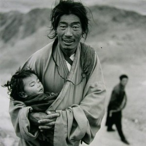 "Pilgrims on the Ling Khor Ganden, Tibet, 1994, silver gelatin print." Photo and caption by Kevin Bubriski.