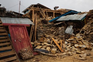 "Inhabitants salvage building materials from their destroyed homes in Gumda Village, near the epicenter of the earthquake in Gorkha district, where five people died and 14 are still missing in landslides, May 8, 2015." Photo and caption by James Nachtwey, TIME Magazine, May 15, 2015.